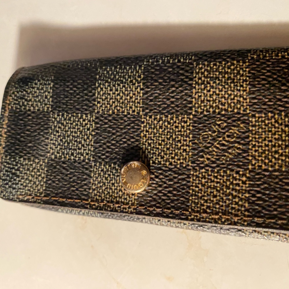 Louie Vutton Vintage Preloved key case with some wear